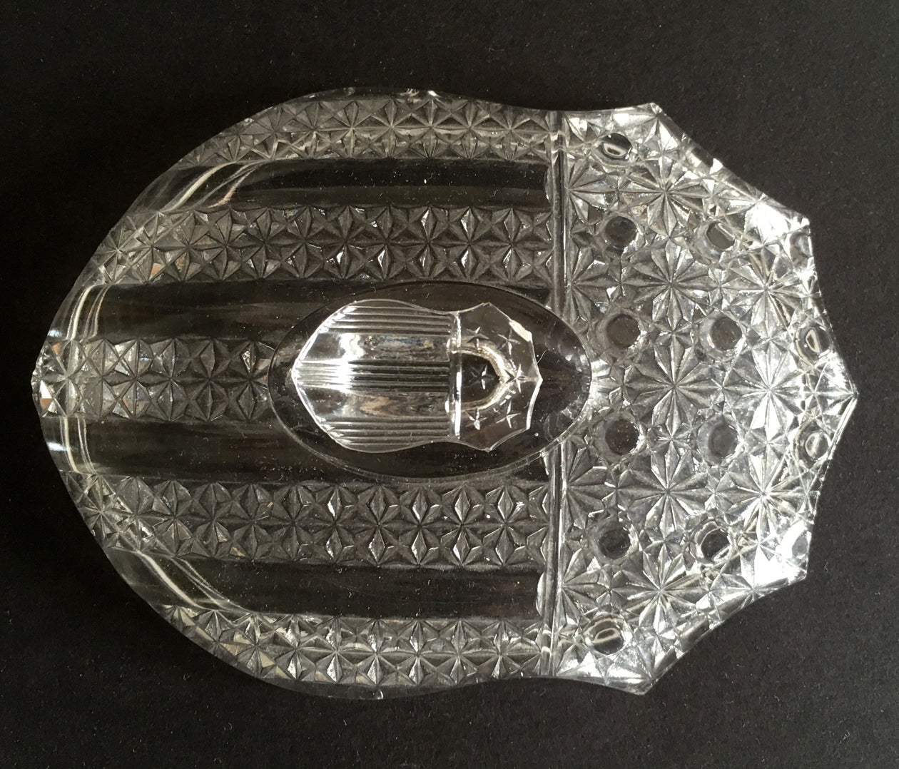 Overview of Banner pattern glass butter dish lid with American flag design.