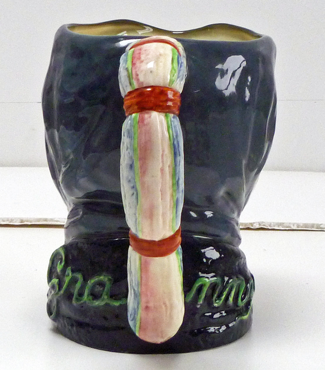 Handle of a large Royal Doulton single toothed Granny jug.