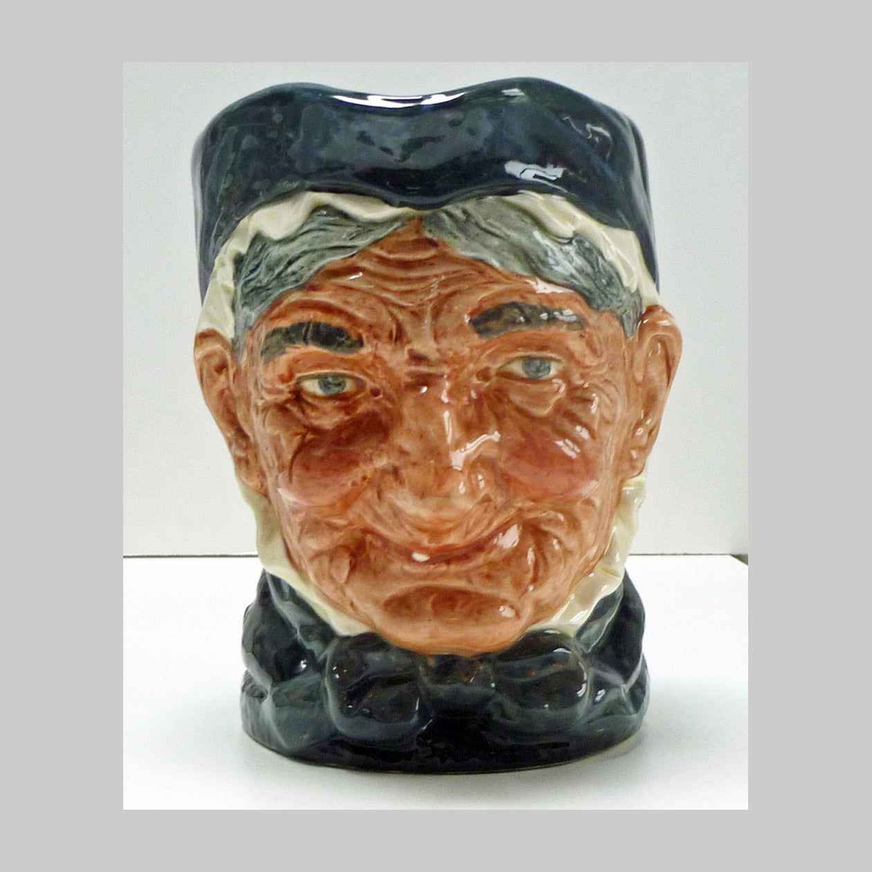 Royal Doulton large character jug with handle of a single toothed Granny figure.