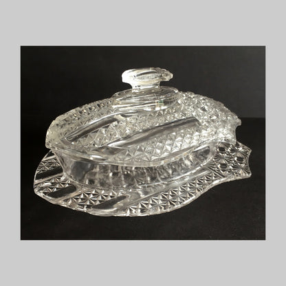 Antique clear pressed glass covered butter dish of American flag Banner pattern. 