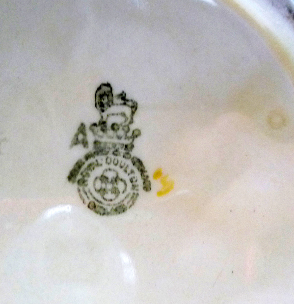 Close-up of Royal Doulton stamped mark on the bottom of a Cavalier jug.