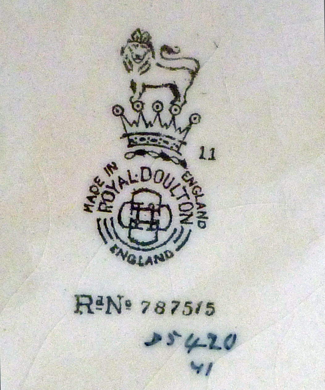 Close-up of Royal Doulton stamped mark on the bottom of an Old Charley jug.