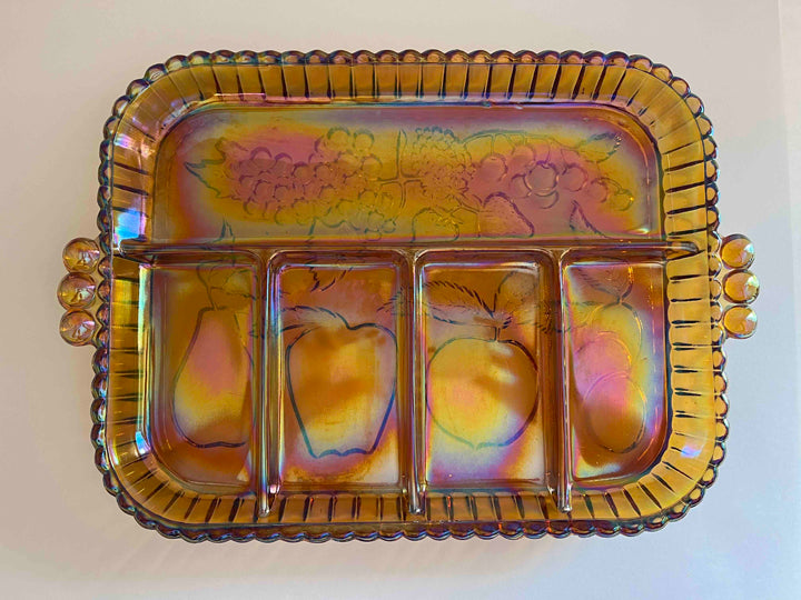 Looking from above at a vintage relish tray in iridescent gold and fruits design.