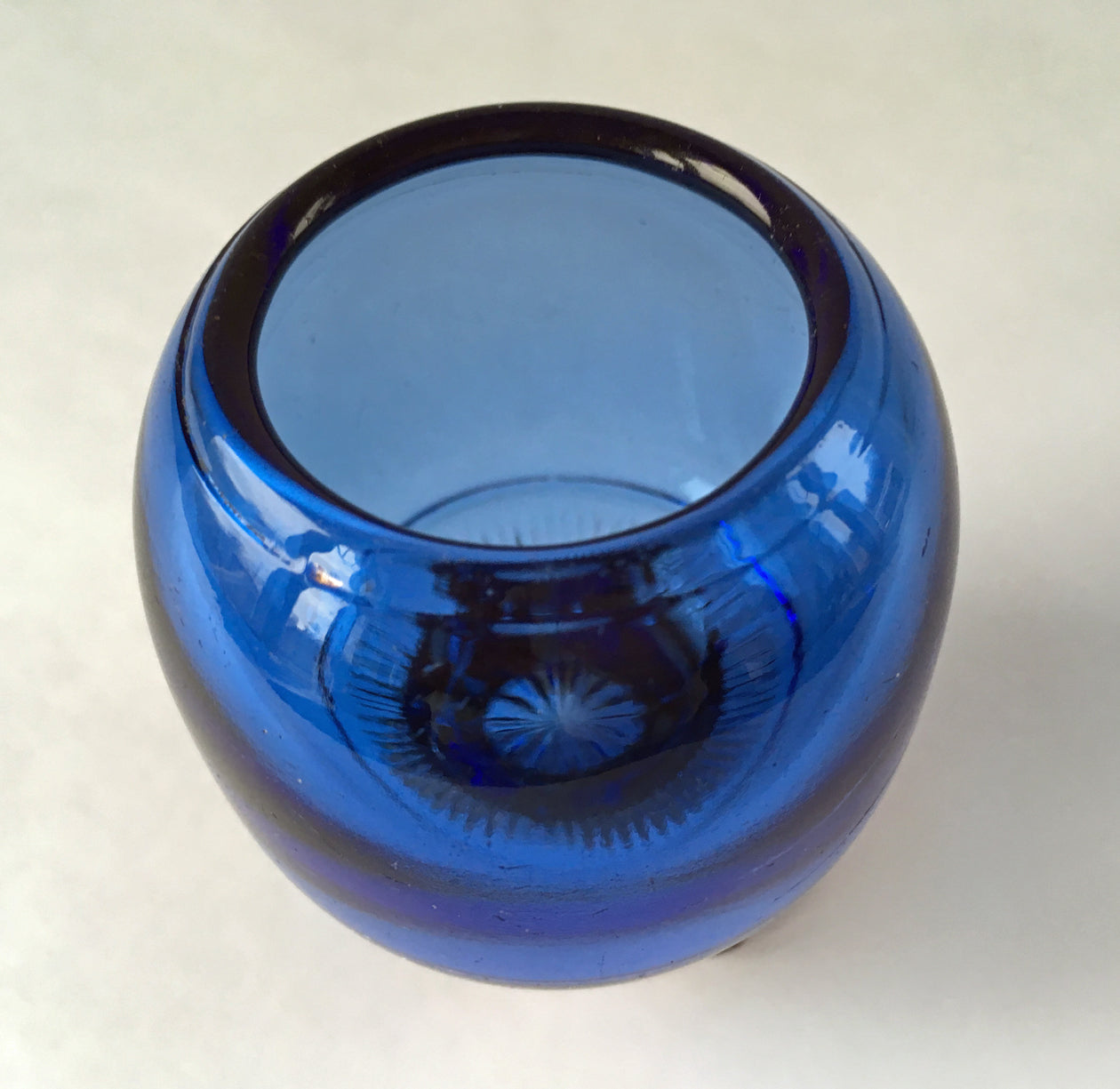 Looking into the inside of a Dewey blue rose bowl in Colorado pattern.
