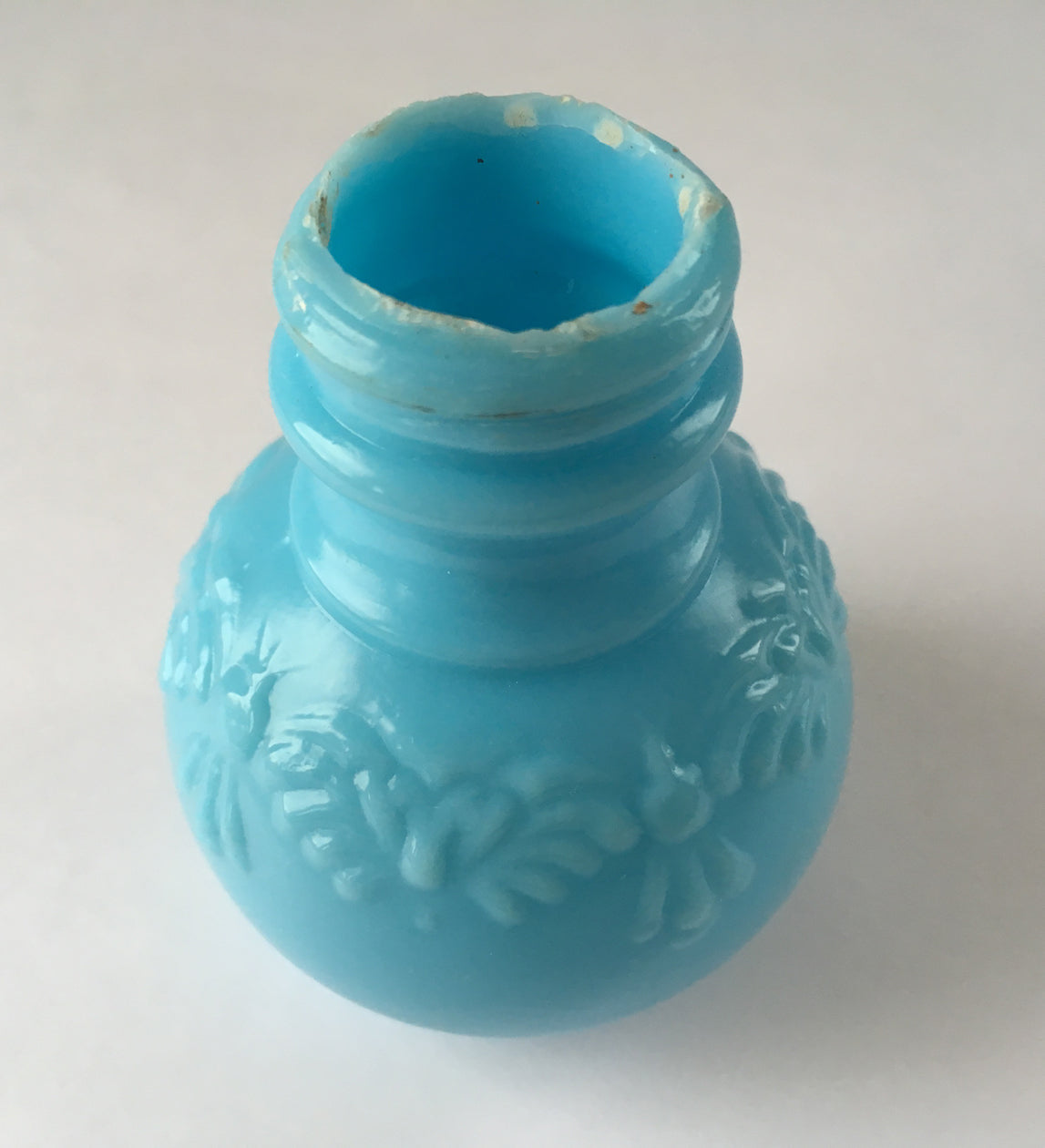 EAPG Butterfly and Tassel pattern blue milk glass salt shaker angle image